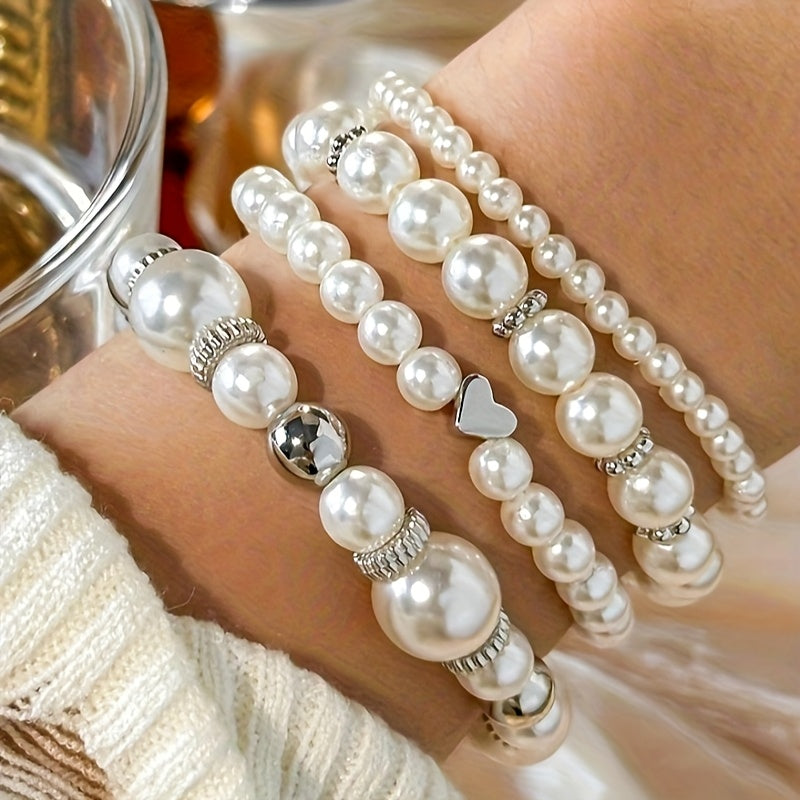 Conjunto de pulseras elegantes en forma de corazón con perlas