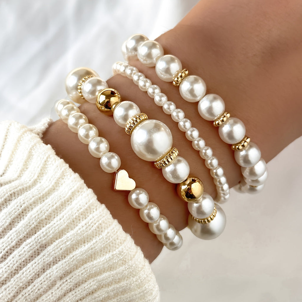 Conjunto de pulseras elegantes en forma de corazón con perlas