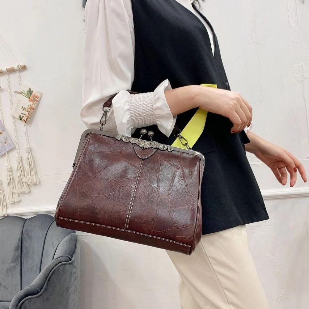 Borsa vintage con chiusura a scatto