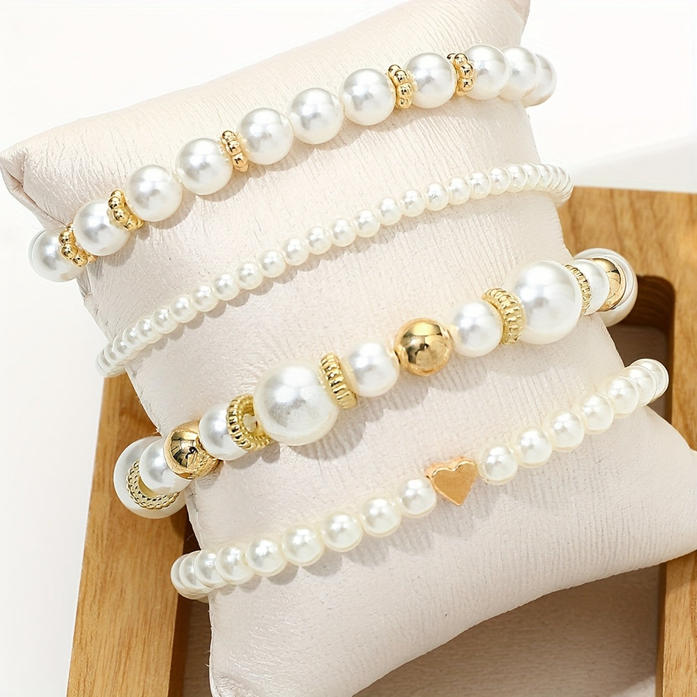 Conjunto de pulseras elegantes en forma de corazón con perlas
