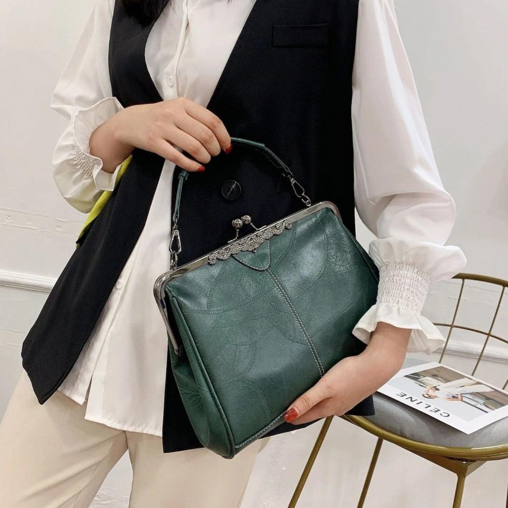 Borsa vintage con chiusura a scatto