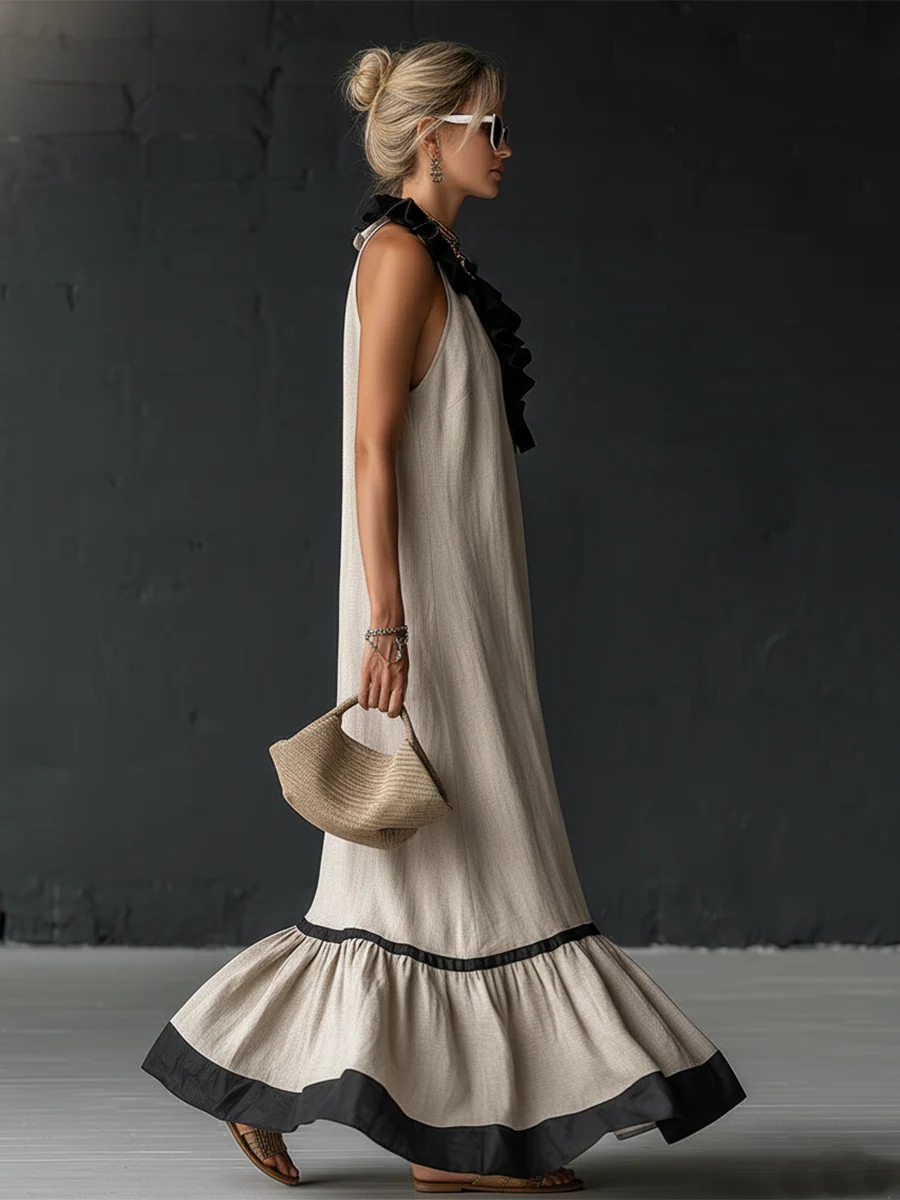 Vestito maxi elegante e romantico con volant e blocchi di colore