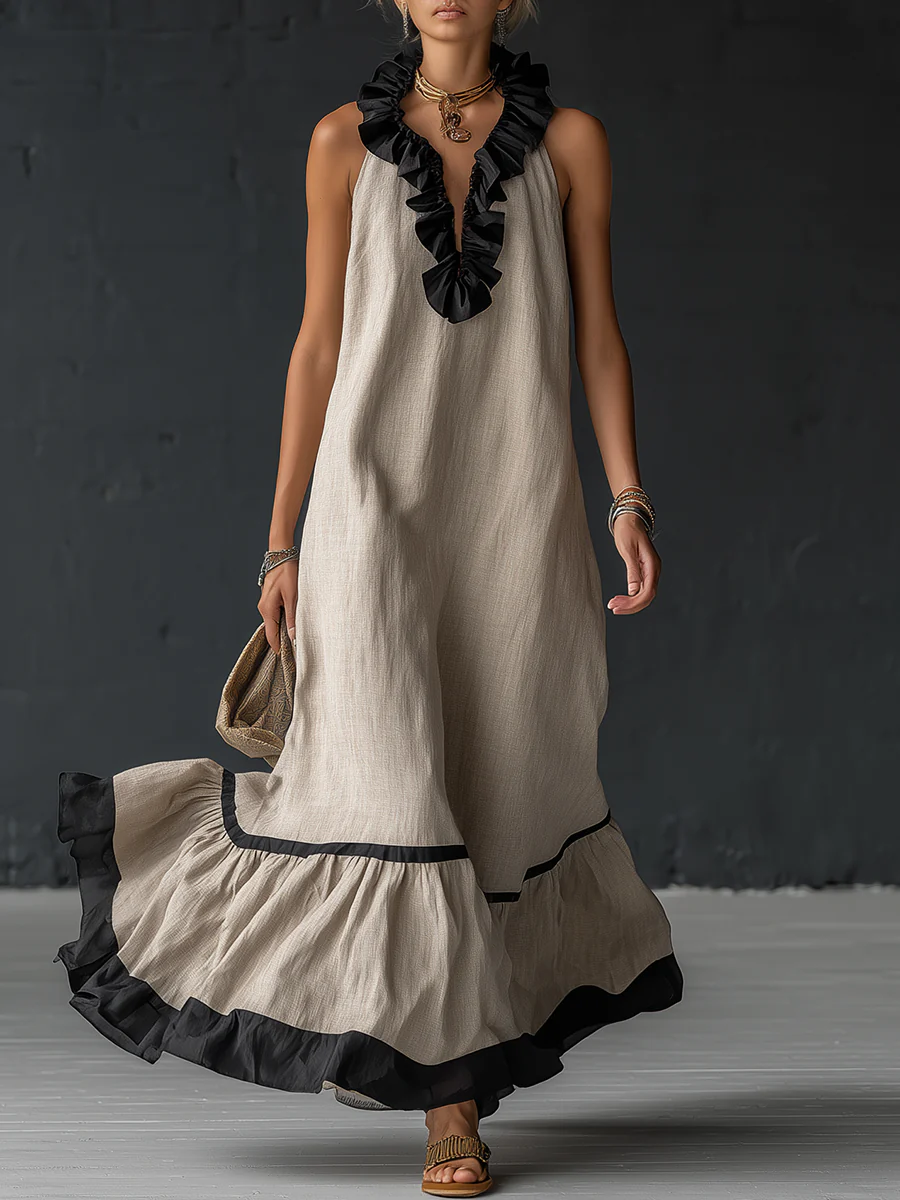 Vestito maxi elegante e romantico con volant e blocchi di colore