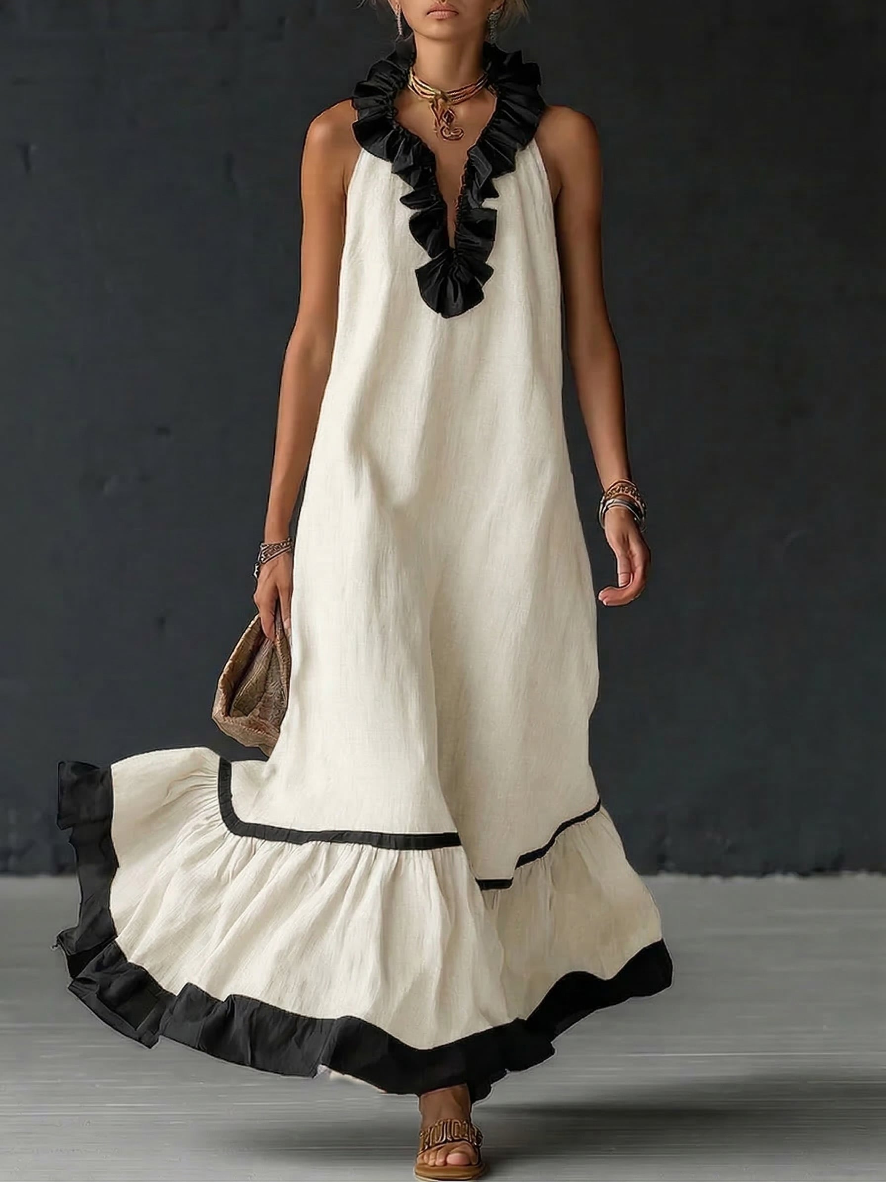 Vestito maxi elegante e romantico con volant e blocchi di colore