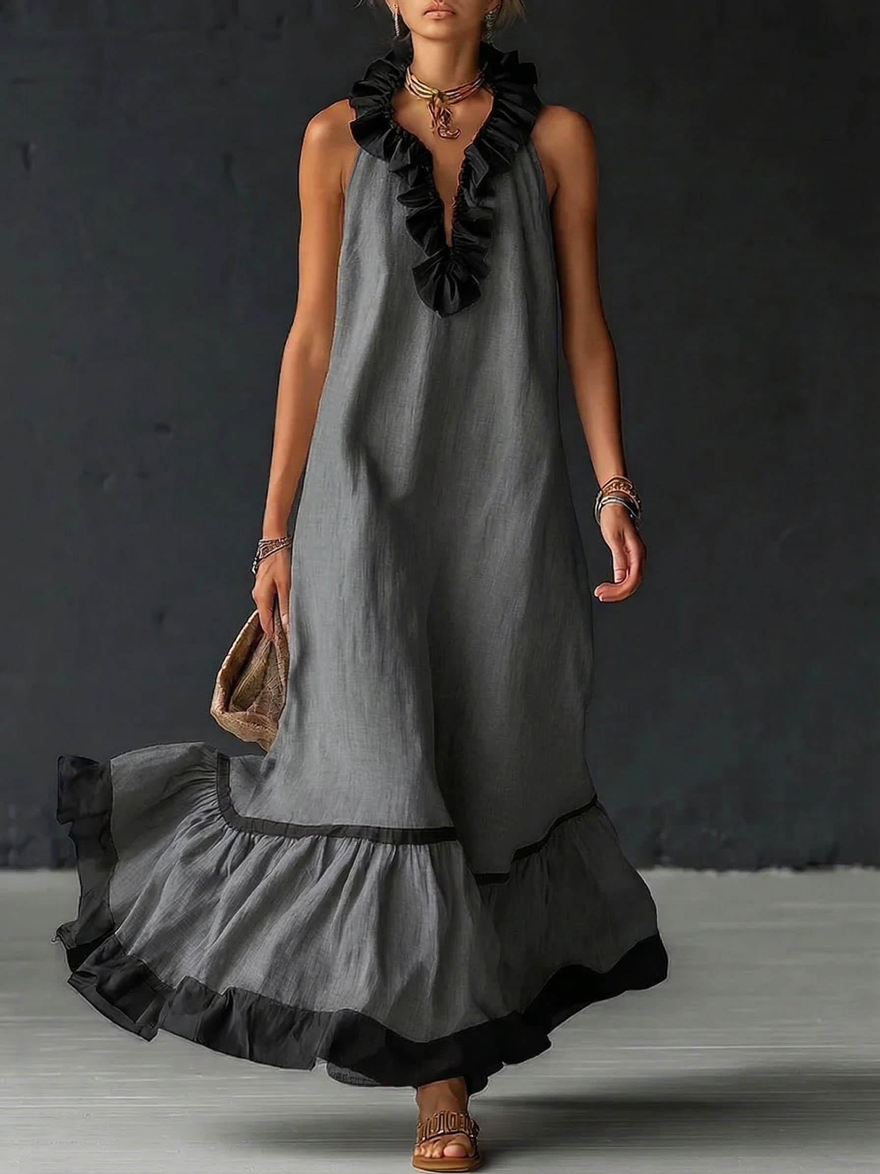 Vestito maxi elegante e romantico con volant e blocchi di colore