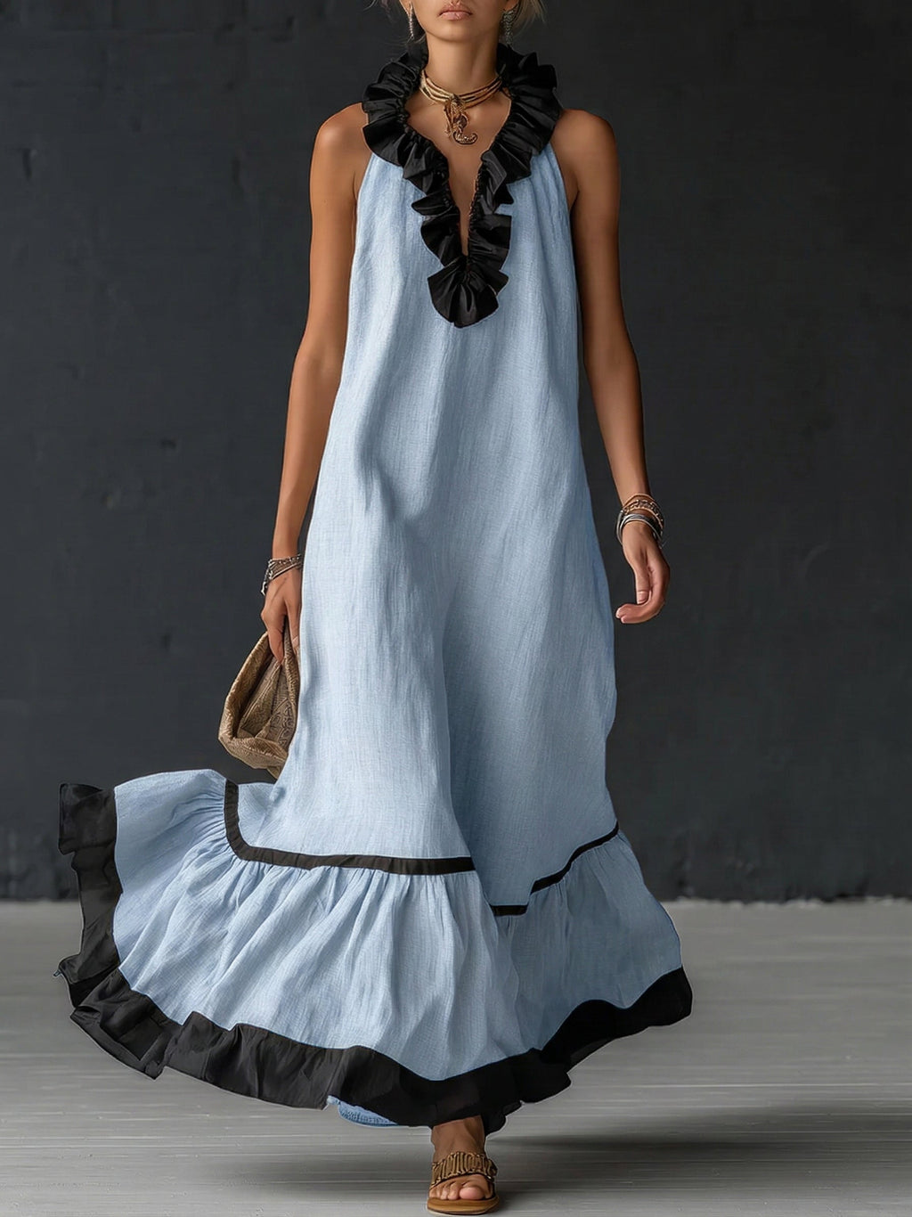 Vestito maxi elegante e romantico con volant e blocchi di colore